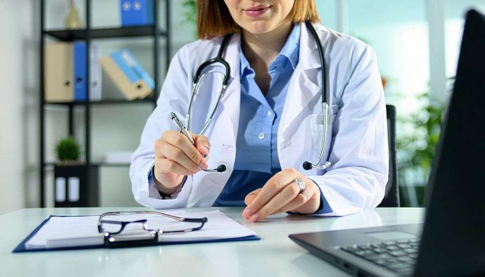 Doctor providing medical consultation at a workplace Doctor providing medical consultation at a workplace